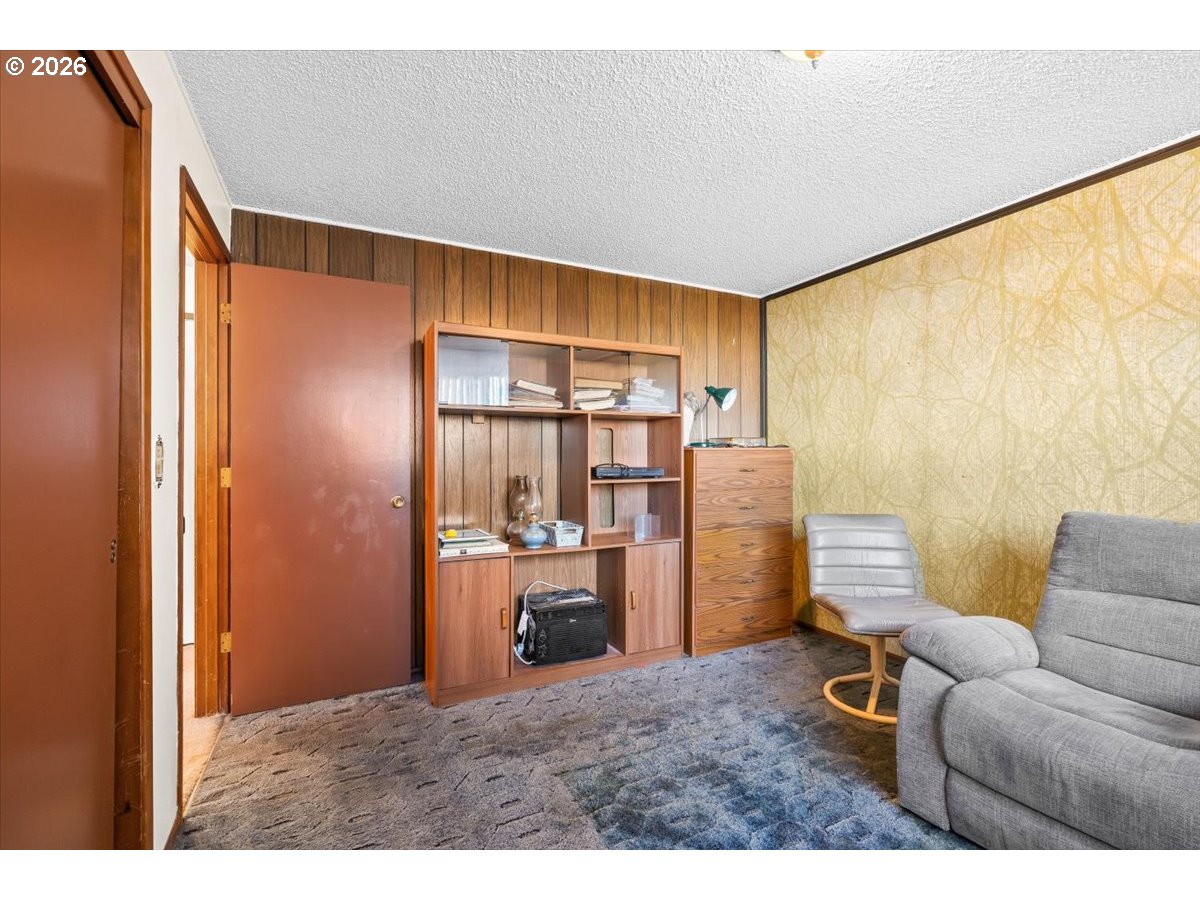904 South Magnolia Street Cornelius, OR 97113 - Photo 11 of 28 a living room with furniture and a window