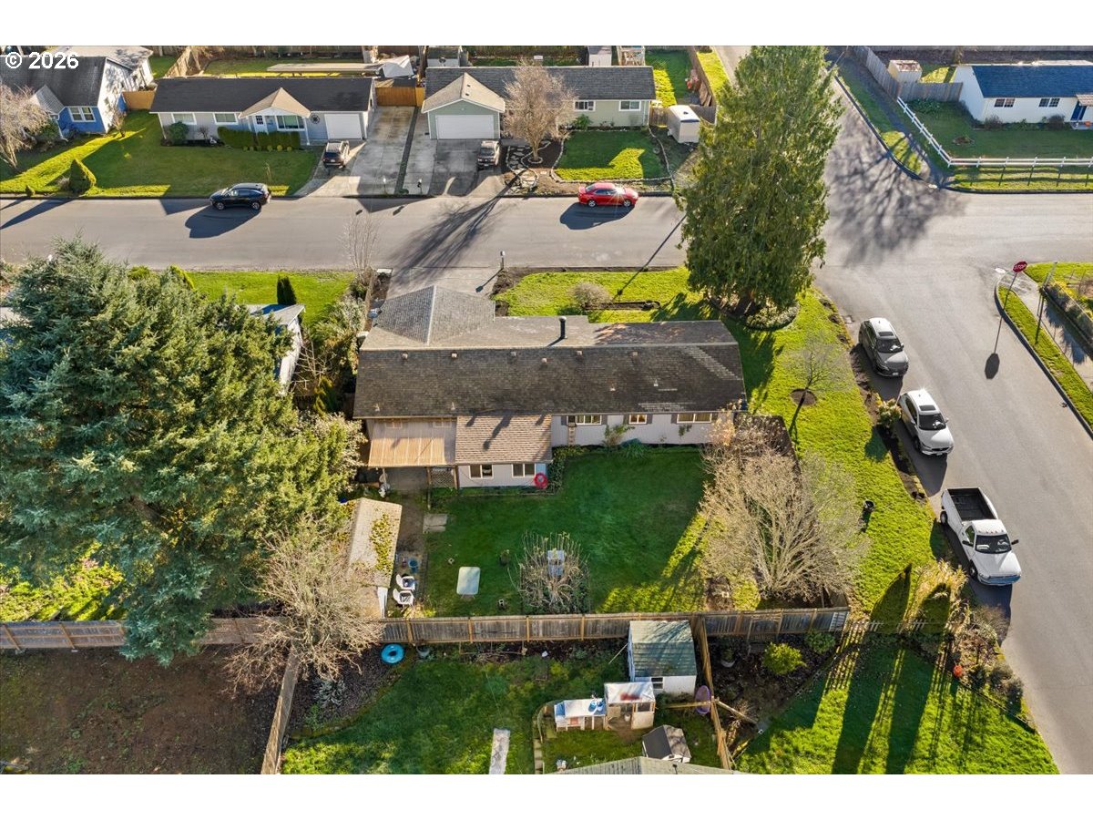 904 South Magnolia Street Cornelius, OR 97113 - Photo 23 of 28 an aerial view of swimming pool a yard and mountain view in back