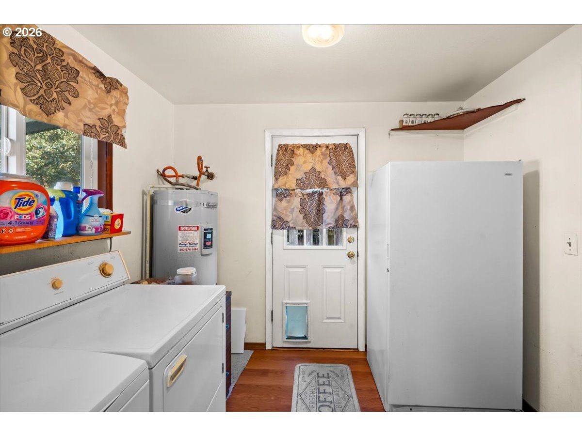 904 South Magnolia Street Cornelius, OR 97113 - Photo 28 of 28 a room with a baby crib and a dresser