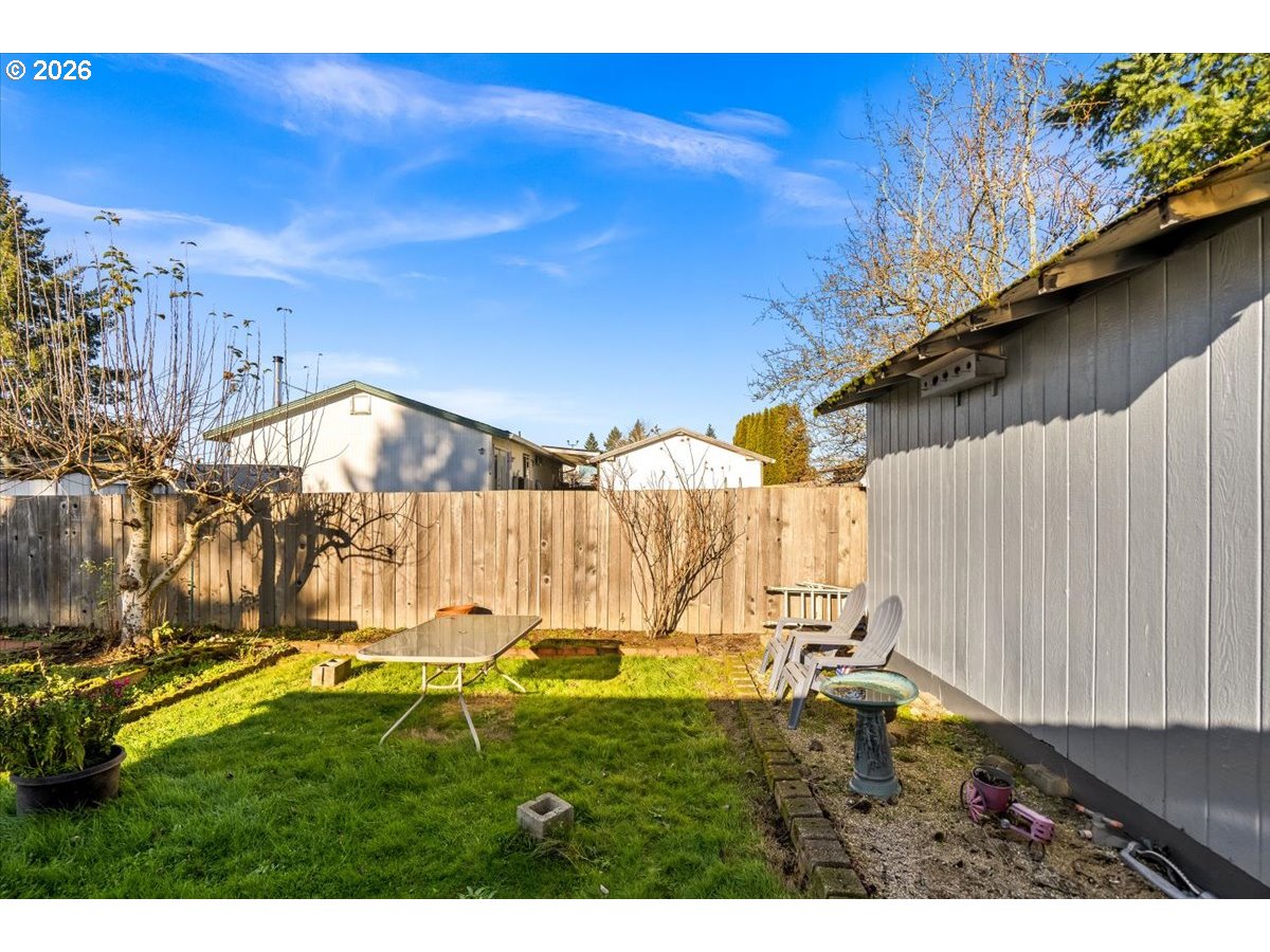 904 South Magnolia Street Cornelius, OR 97113 - Photo 5 of 28 a view of outdoor space with wooden fence