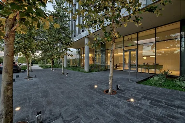 a view of a building with a tree