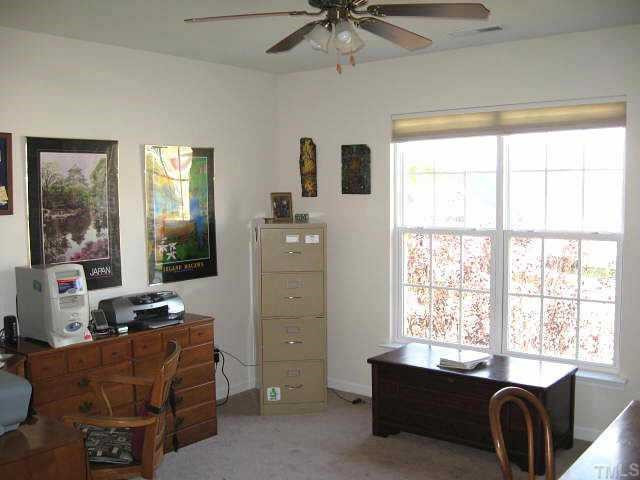 7710 Elon Drive Raleigh, NC 27613 - Photo 11 of 12 Second upstairs bedroom with walk-in closet; could be an office Other