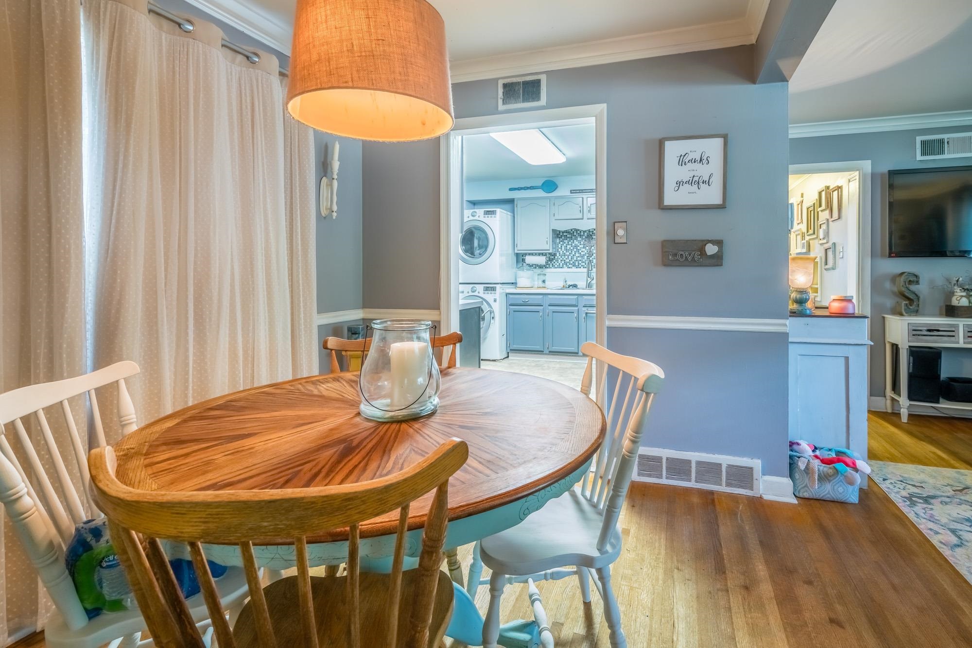1632 South Perkins Road Memphis, TN 38117 - Photo 17 of 25 a view of a dining room with furniture and wooden floor