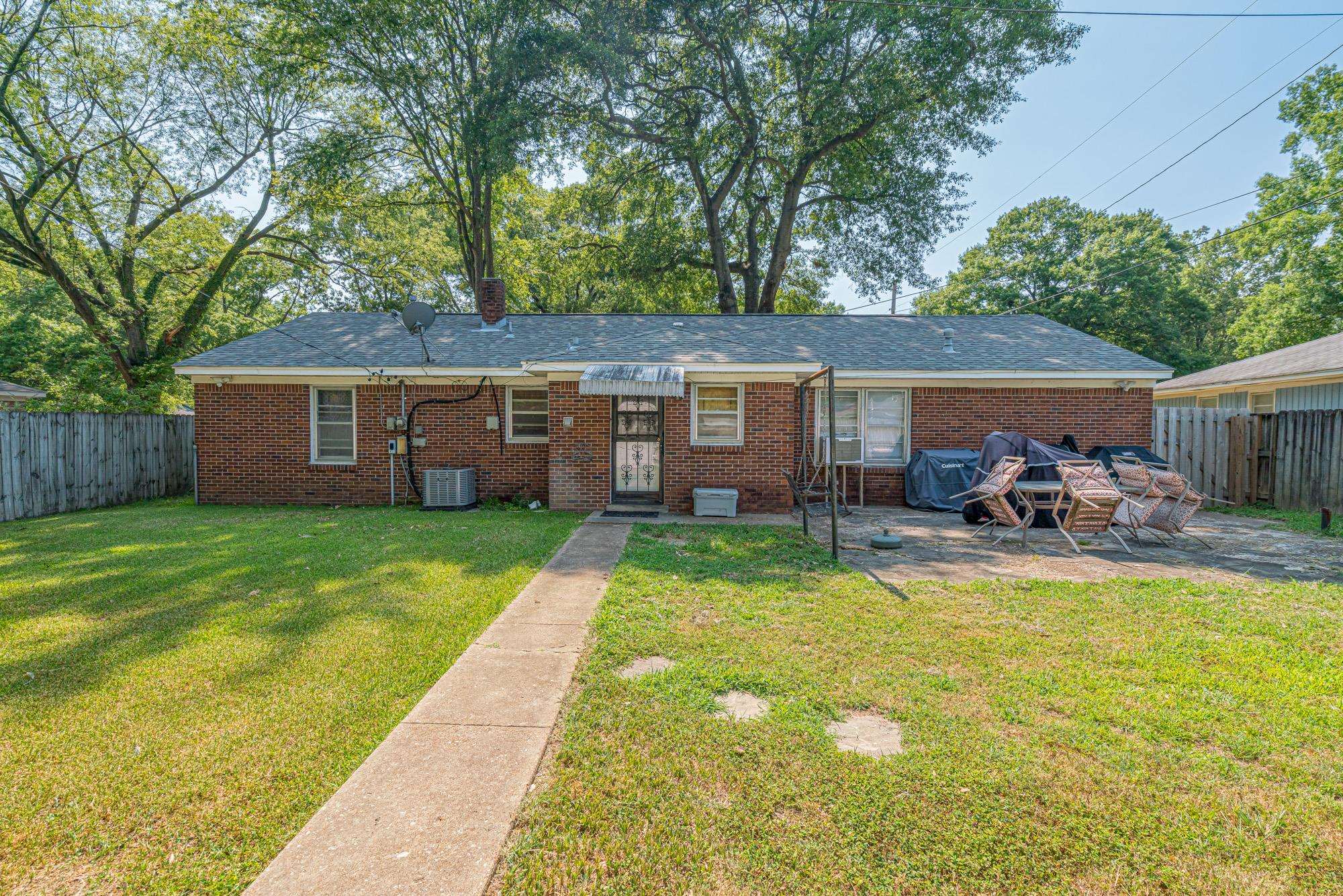 1632 South Perkins Road Memphis, TN 38117 - Photo 2 of 25 a view of a house with a swimming pool and a chairs