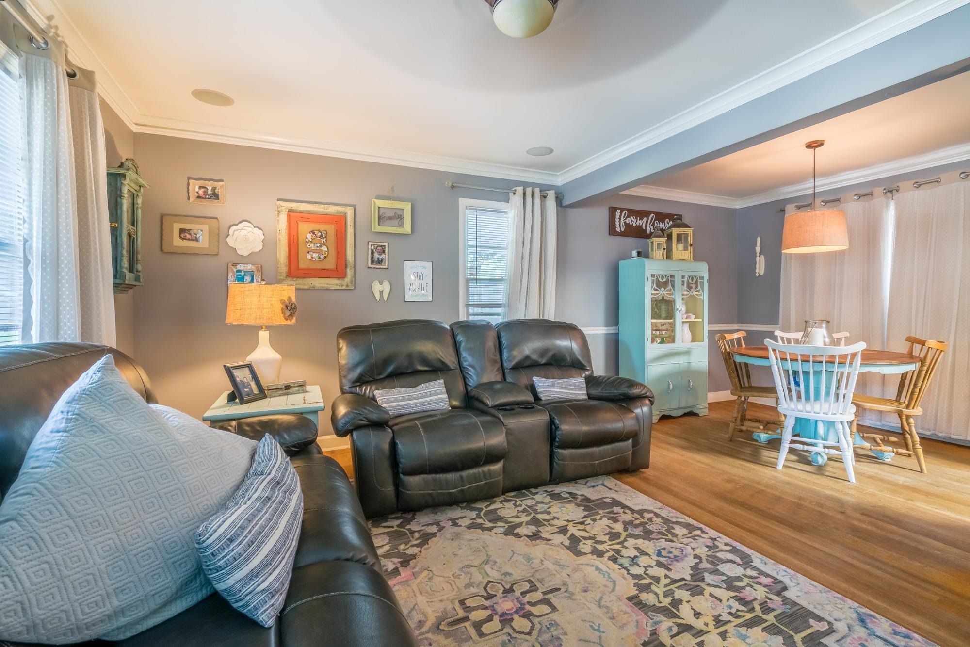 1632 South Perkins Road Memphis, TN 38117 - Photo 9 of 25 a living room with furniture and a wooden floor