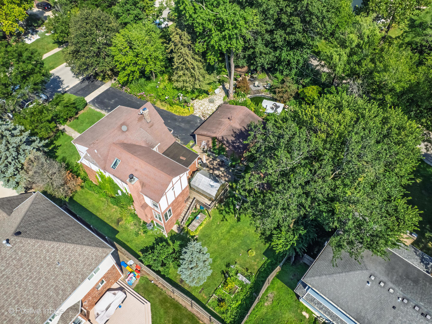 245 Middaugh Road Clarendon Hills, IL 60514 - Photo 4 of 10 an aerial view of a house with garden space and street view