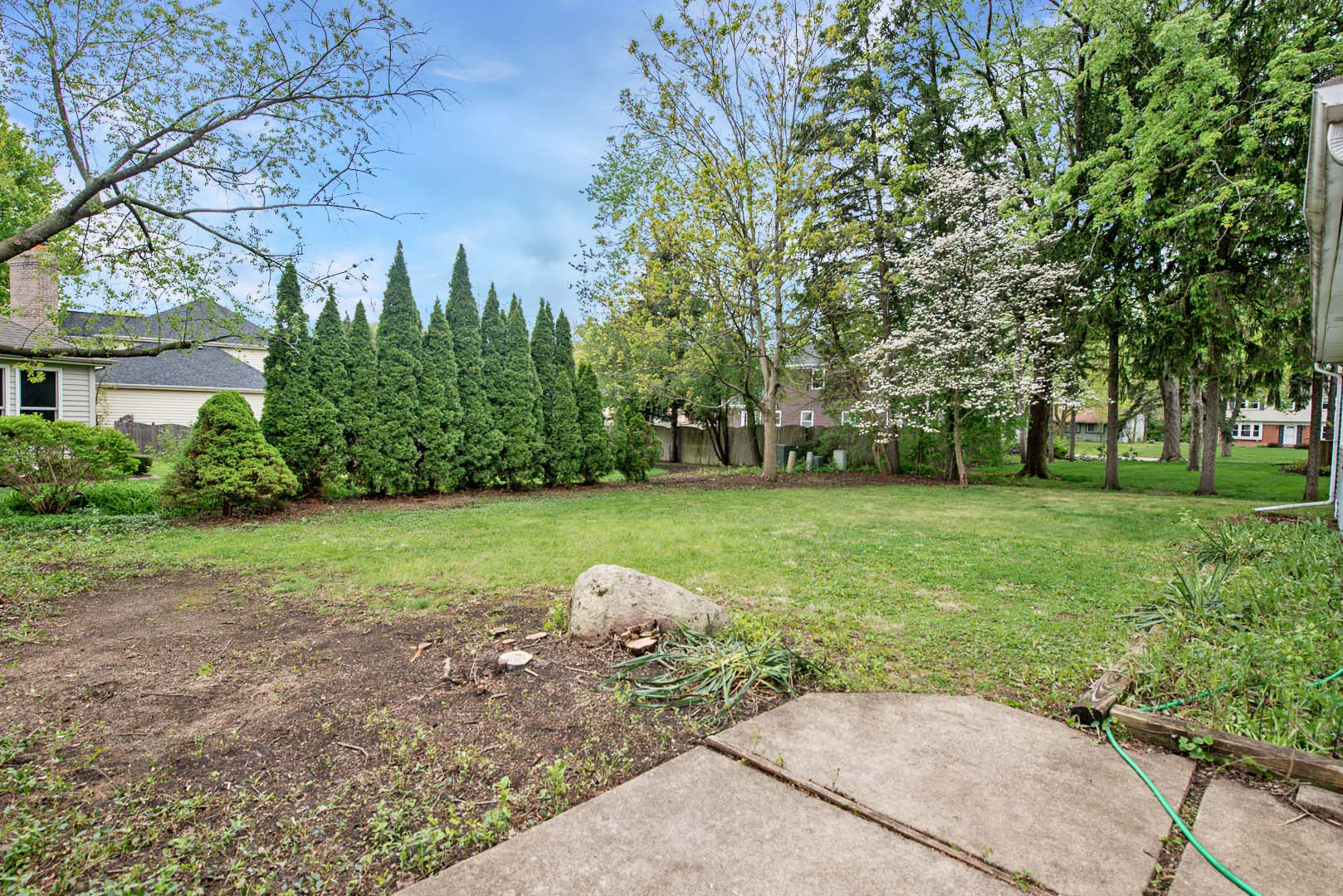 106 Foxcroft Road Naperville, IL 60565 - Photo 20 of 21 a backyard of a house with lots of green space