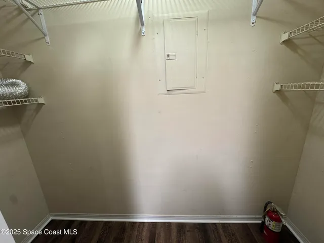 a view of small space with racks on the wall