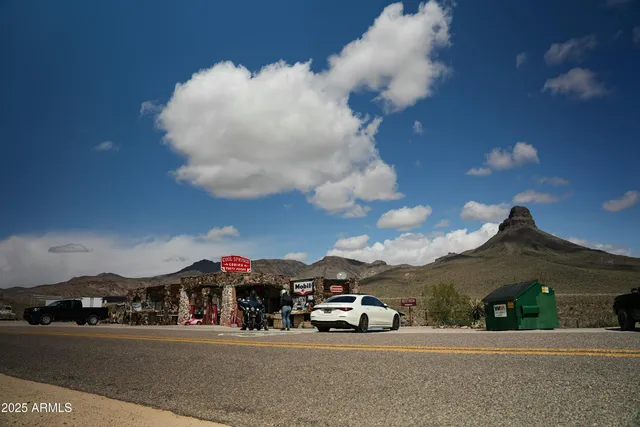 a view of street with parked cars