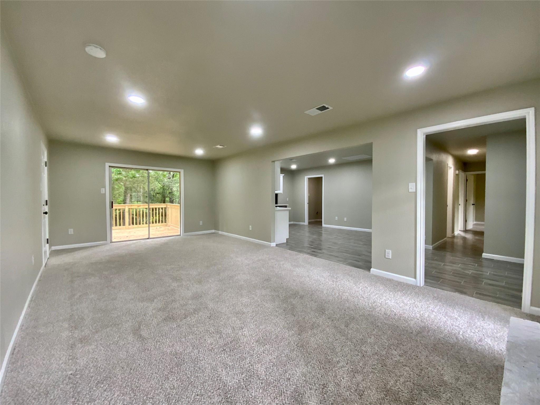 296 Kings Row Street Livingston, TX 77351 - Photo 16 of 35 Living to Foyer and Kitchen Area