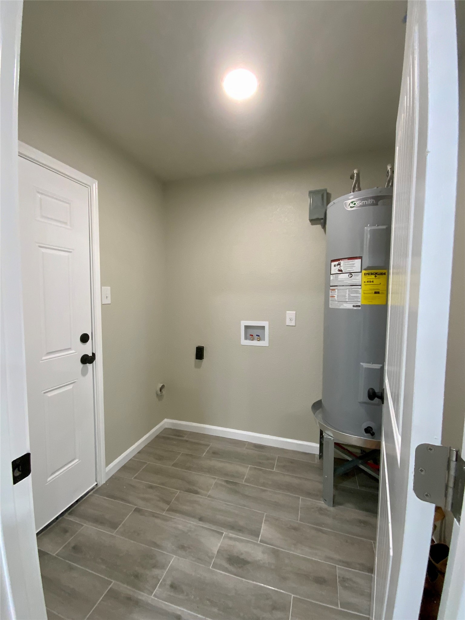 296 Kings Row Street Livingston, TX 77351 - Photo 23 of 35 Utility Room with New Water Heater