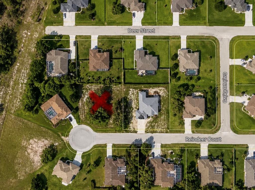9925 Reindeer Court Spring Hill, FL 34608 - Photo 3 of 8 an aerial view of a house