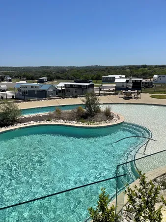 a view of a swimming pool with an outdoor space