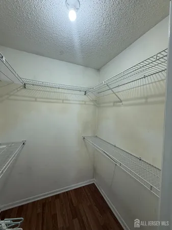a view of a room with racks on the wall