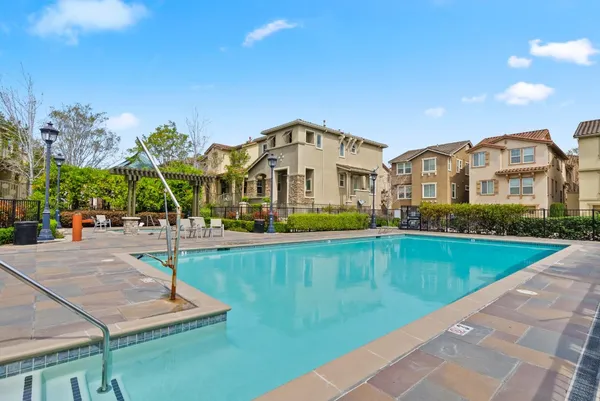 a front view of a house with swimming pool