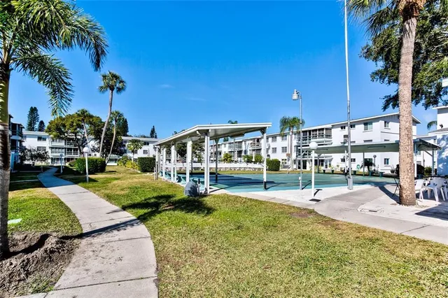 a view of a swimming pool with a patio