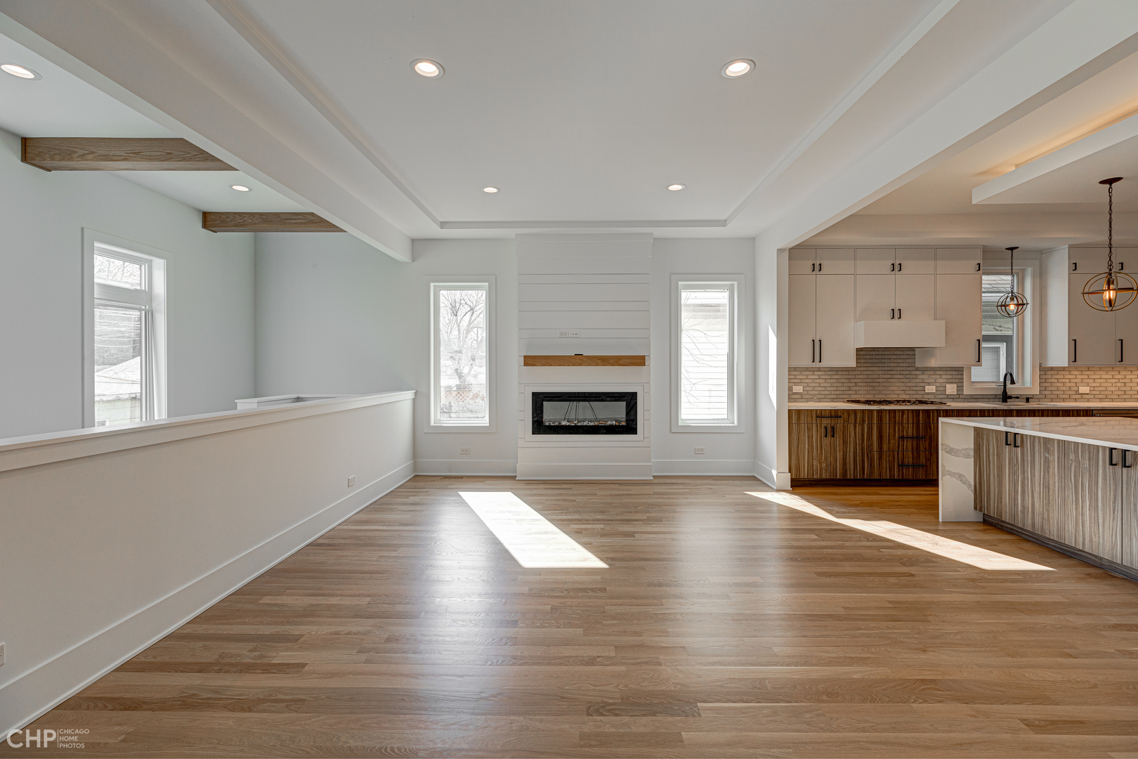 3711 North Spaulding Avenue Chicago, IL 60618 - Photo 15 of 35 a large kitchen with a large counter top and stainless steel appliances