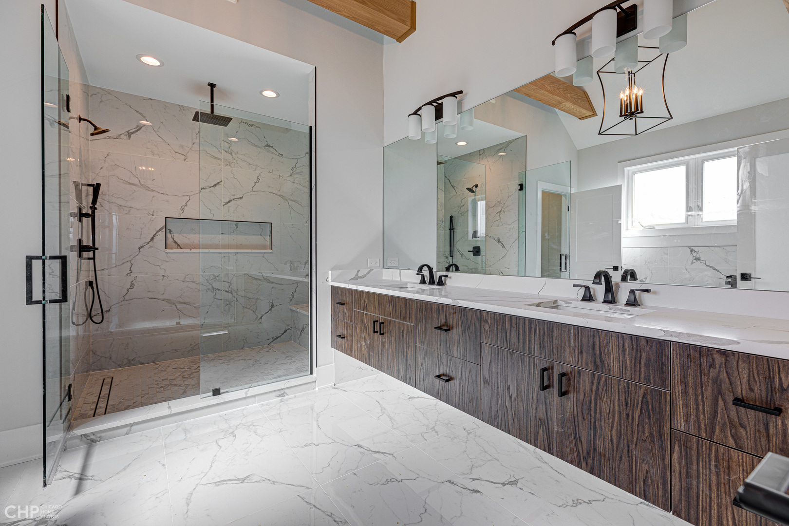 3711 North Spaulding Avenue Chicago, IL 60618 - Photo 19 of 35 a spacious bathroom with a shower sink mirror and