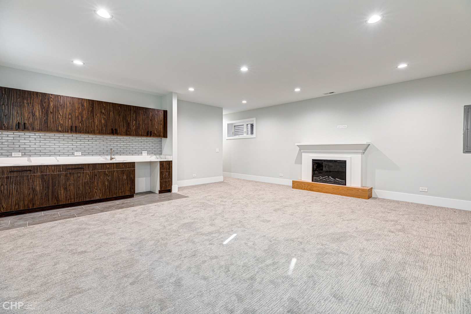 3711 North Spaulding Avenue Chicago, IL 60618 - Photo 29 of 35 a view of an empty room with a fireplace and a window