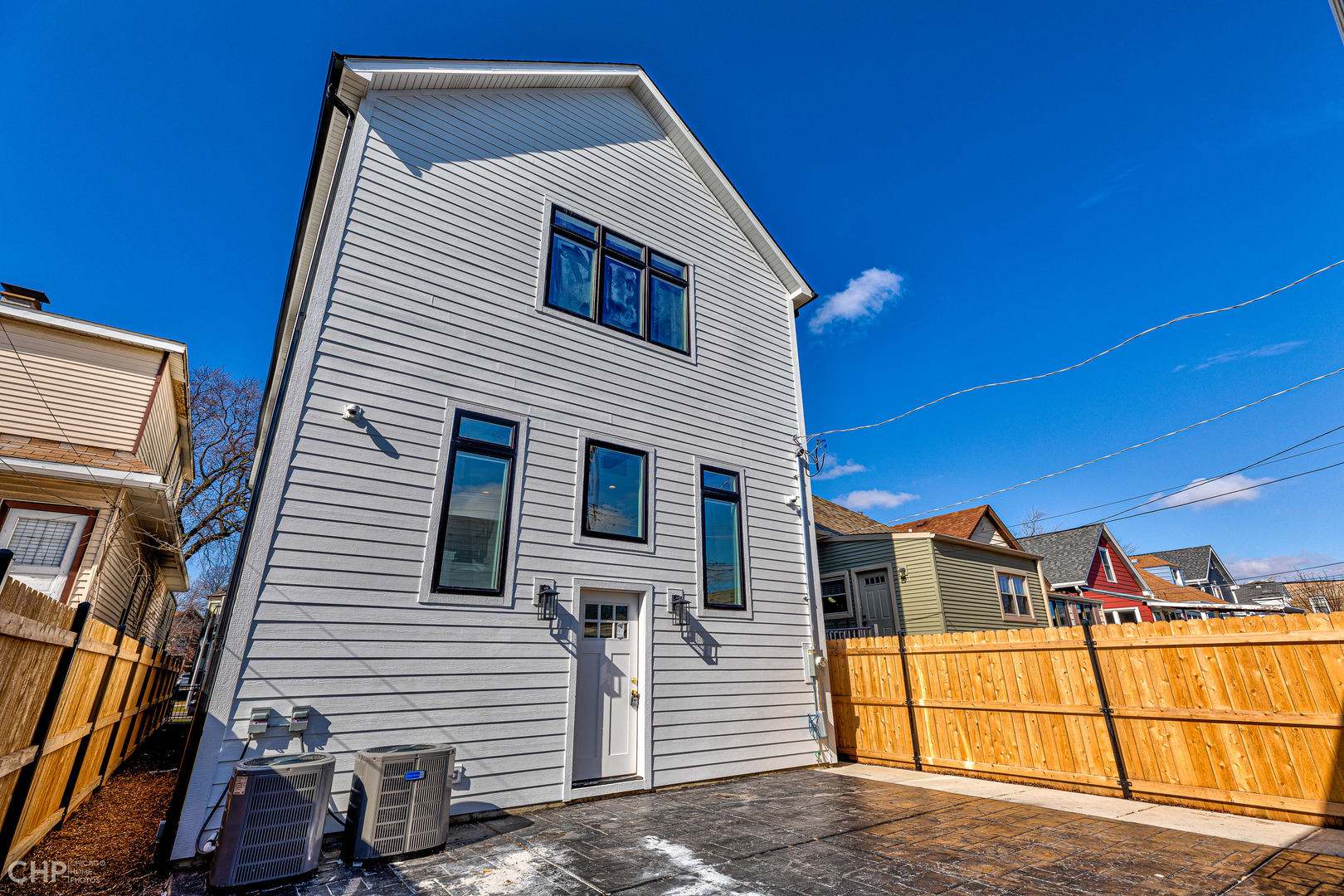 3711 North Spaulding Avenue Chicago, IL 60618 - Photo 33 of 35 a view of a house with a yard