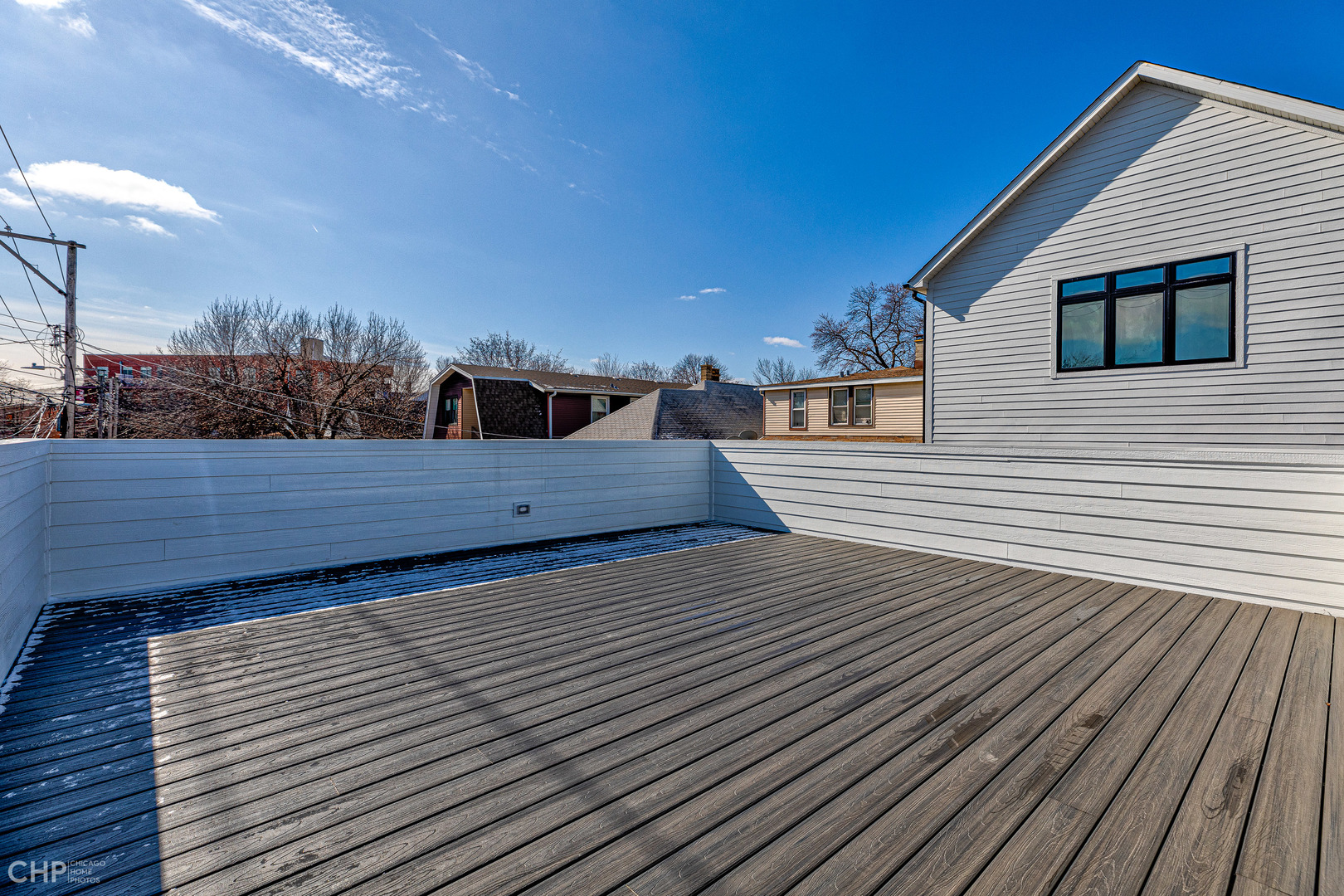 3711 North Spaulding Avenue Chicago, IL 60618 - Photo 34 of 35 a view of a balcony with wooden floor
