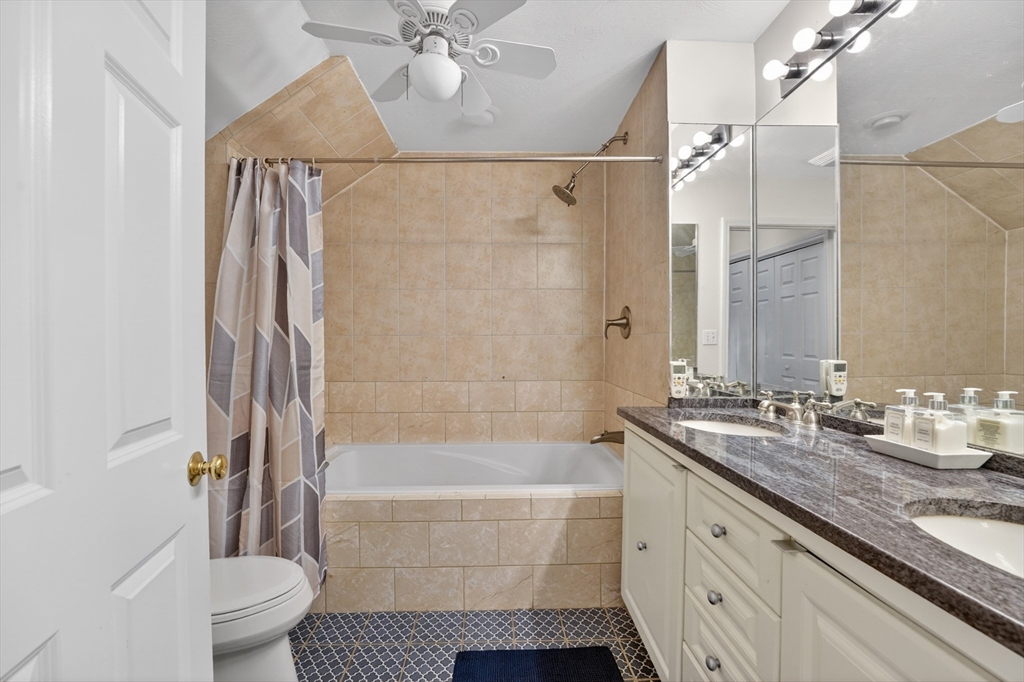 15 Evergreen Circle, Unit 15 Canton, MA 02021 - Photo 17 of 29 a bathroom with a granite countertop sink toilet and shower