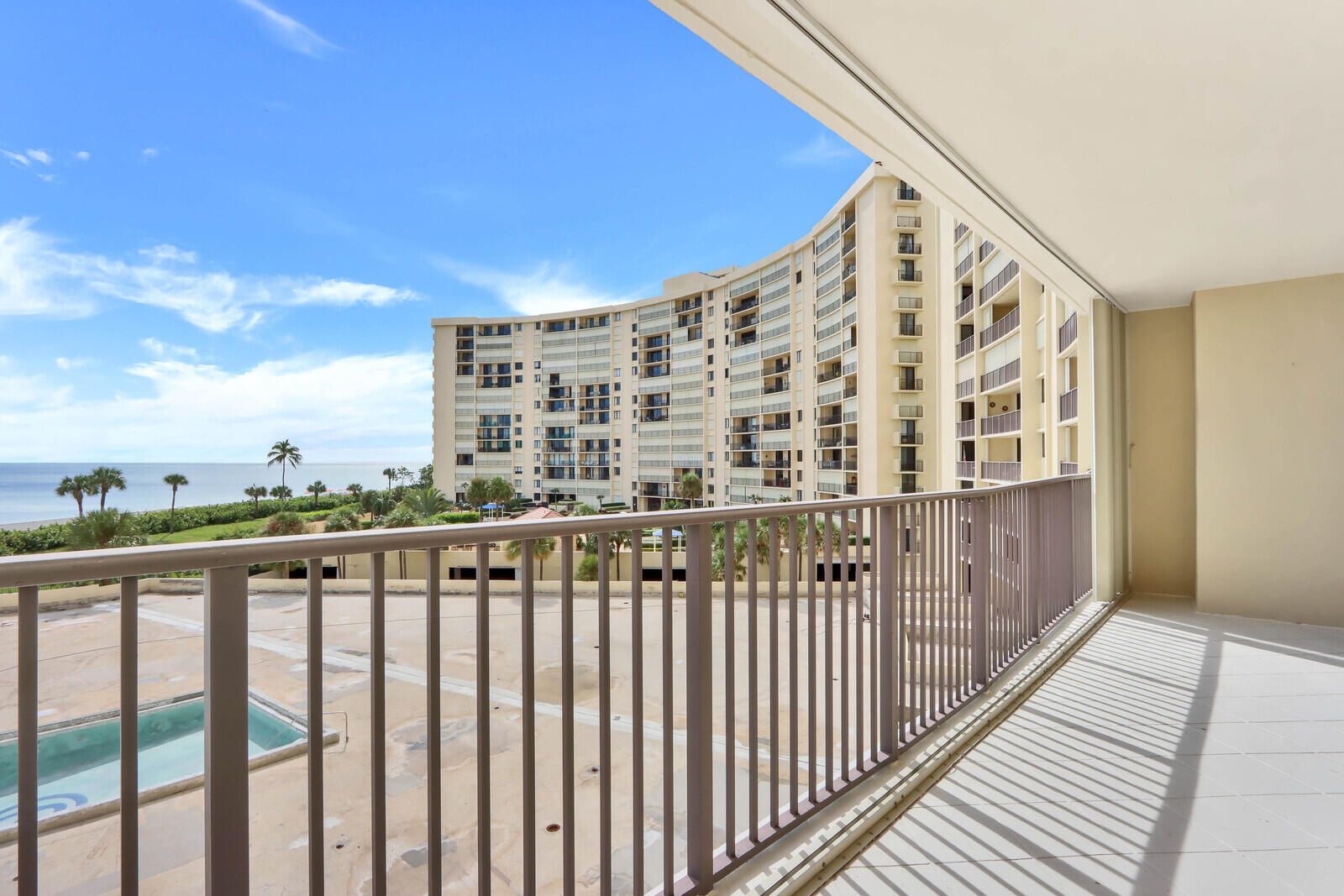 200 Ocean Trail Way, Unit 305 Jupiter, FL 33477 - Photo 18 of 27 a view of balcony with wooden floor