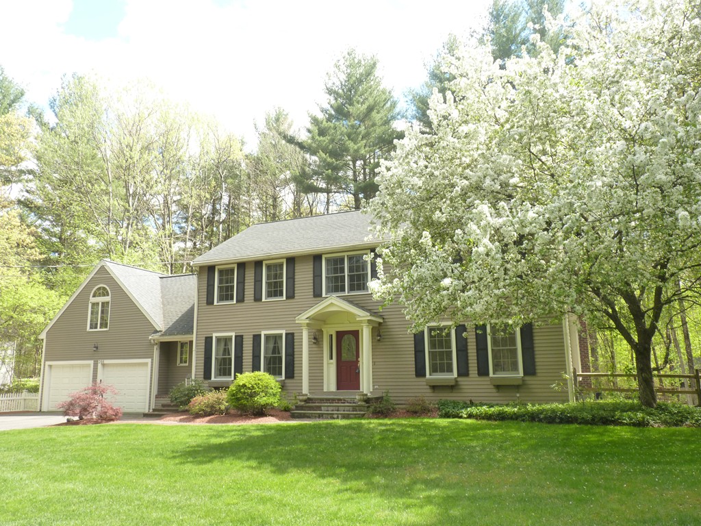 266 Sargent Road Boxborough, MA 01719 - Photo 1 of 15 a front view of a house with garden