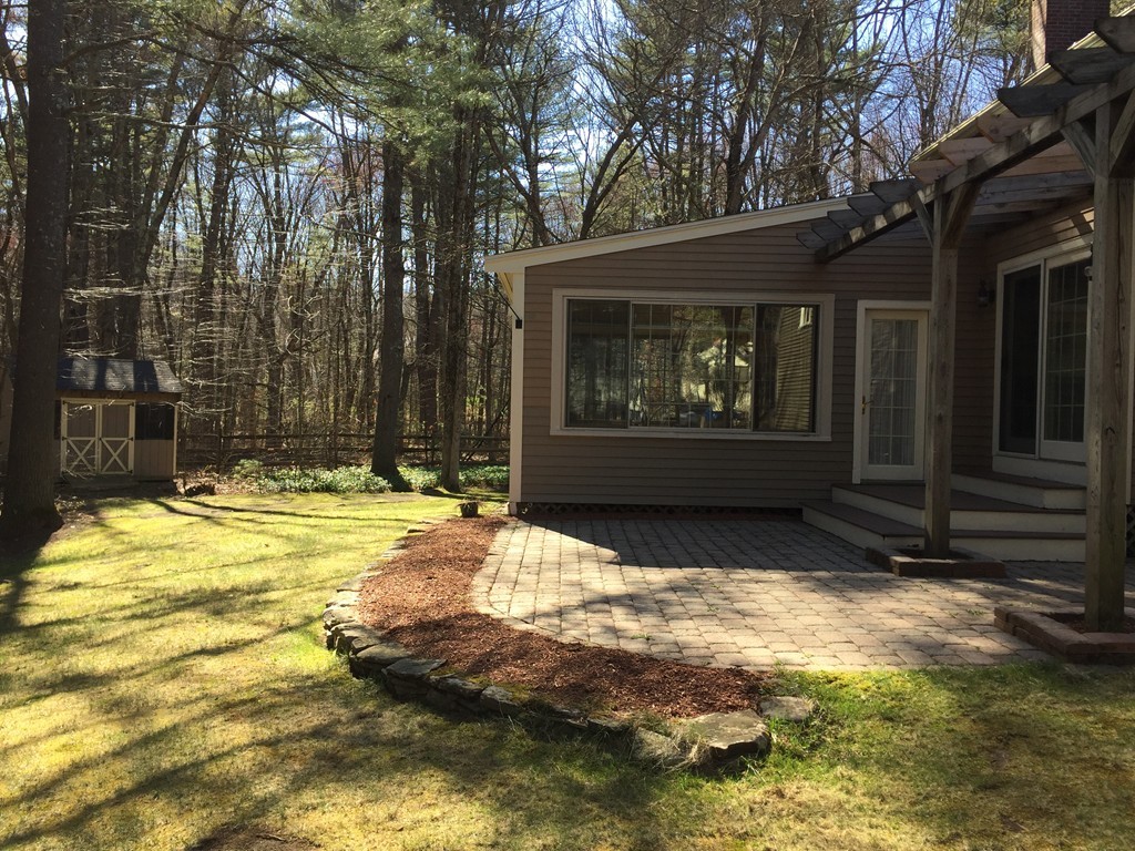 266 Sargent Road Boxborough, MA 01719 - Photo 13 of 15 a view of swimming pool with an outdoor space