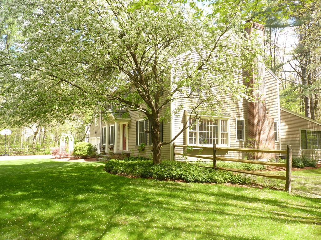 266 Sargent Road Boxborough, MA 01719 - Photo 14 of 15 a front view of a house with a yard
