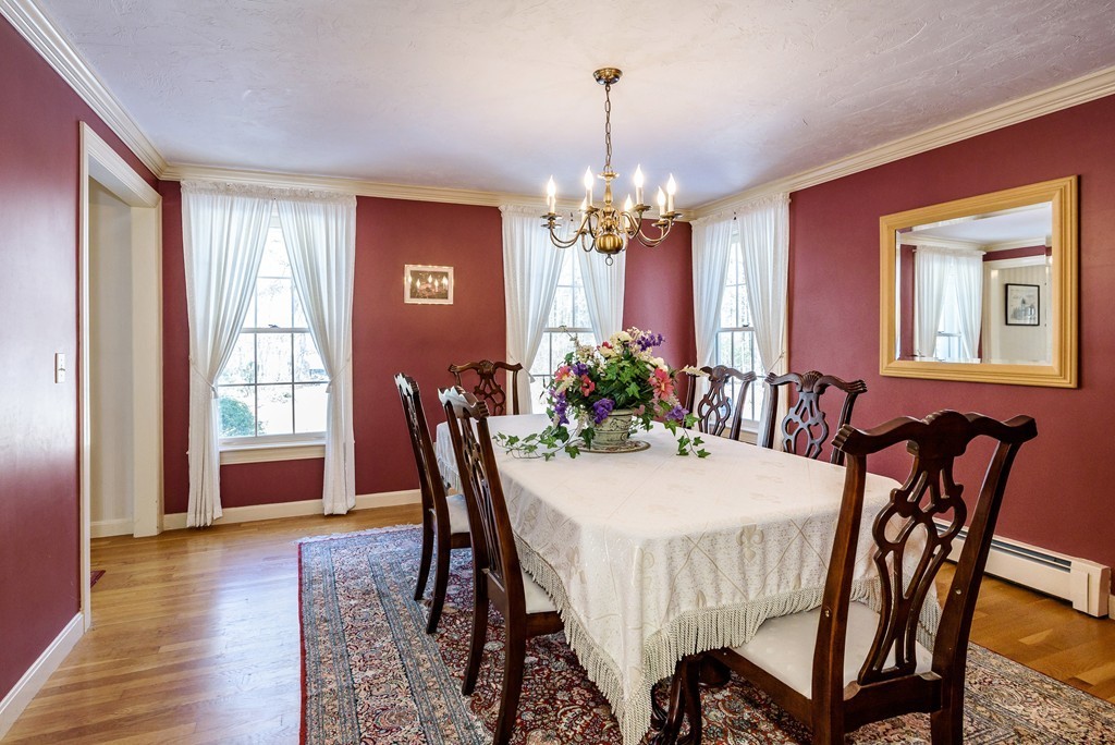 266 Sargent Road Boxborough, MA 01719 - Photo 4 of 15 a view of a dining room with furniture window and wooden floor