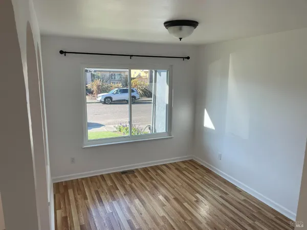 a view of an empty room and window