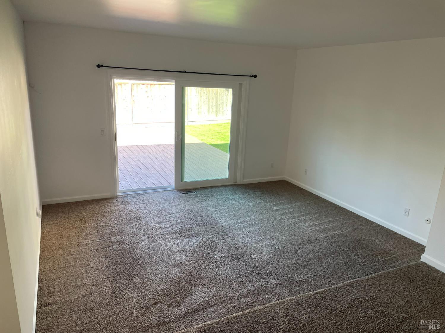 104 Rene Drive Petaluma, CA 94954 - Photo 13 of 23 The primary bedroom is absolutely huge, and it has access to the back deck.