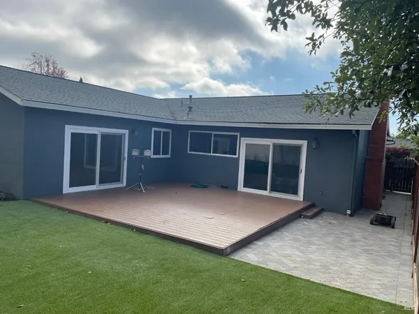 front view of a house with a yard