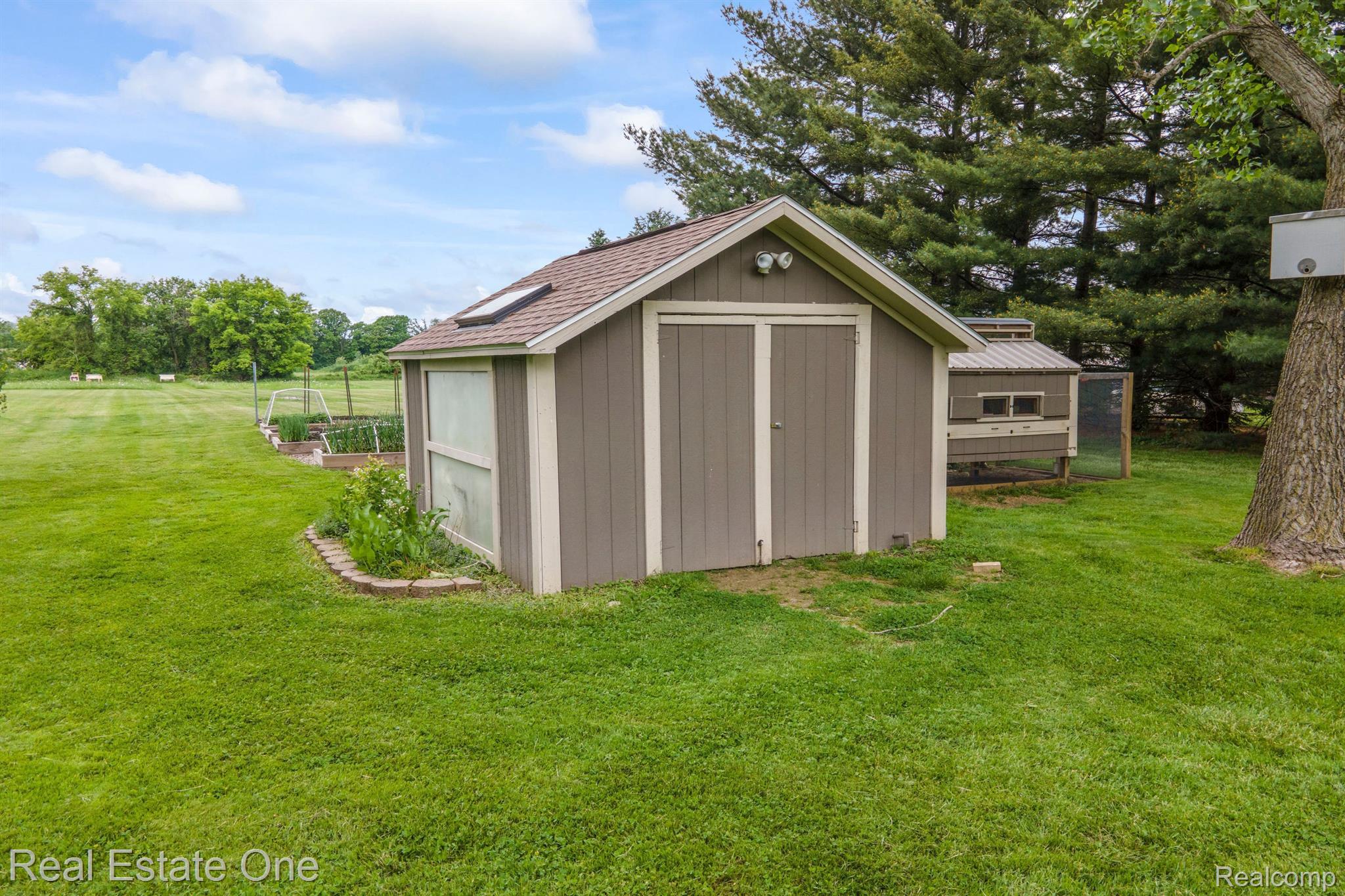 7448 Sharp Road Swartz Creek, MI 48473 - Photo 44 of 49 Shed for extra yard storage.