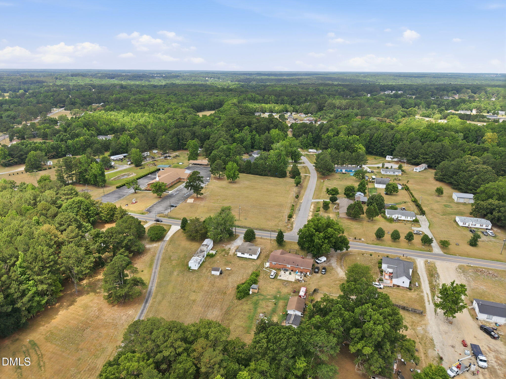 1758 Barber Mill Road Clayton, NC 27520 - Photo 36 of 41 an aerial view of residential houses with outdoor space and river