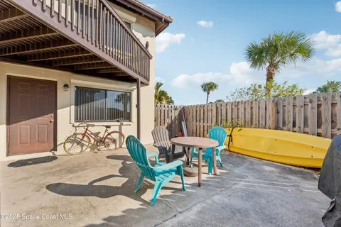 swimming pool view with a outdoor seating