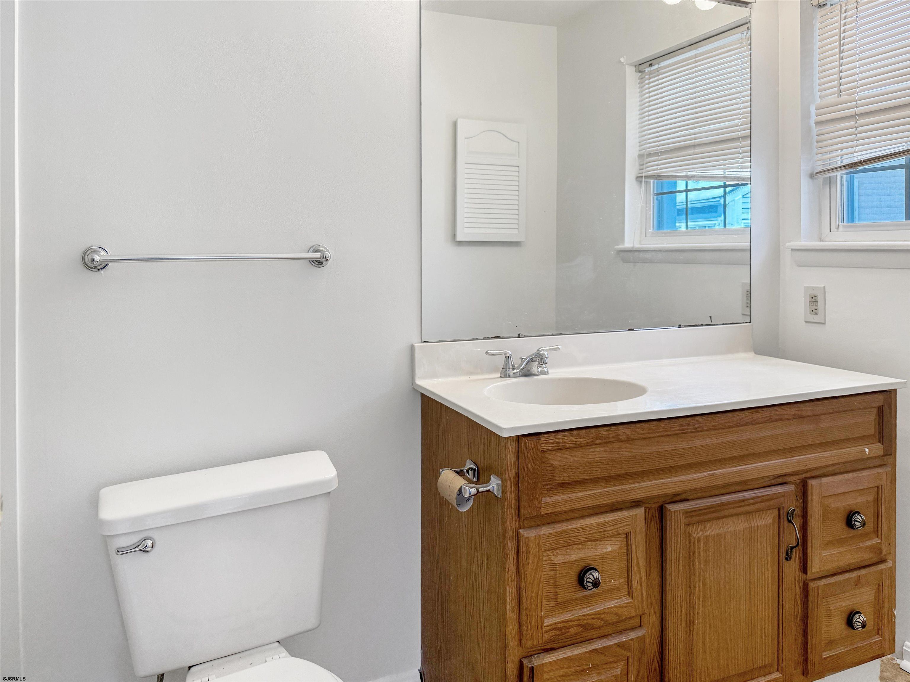 132 Meadow Ridge Road, Unit 132 Smithville, NJ 08205 - Photo 7 of 7 a utility room with dryer and washer