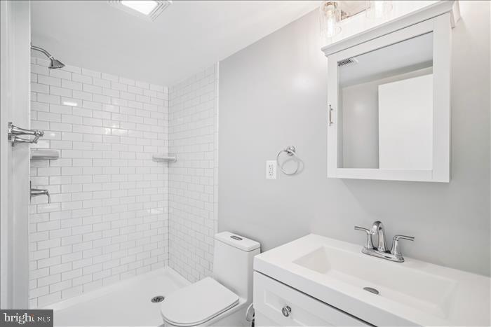 501-503 8th Street Laurel, MD 20707 - Photo 20 of 86 a bathroom with a sink a toilet and shower