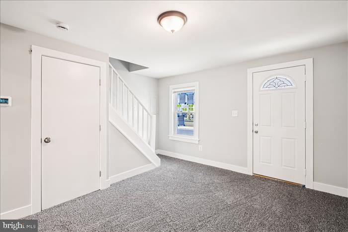 501-503 8th Street Laurel, MD 20707 - Photo 57 of 86 a view of an empty room with window and stairs