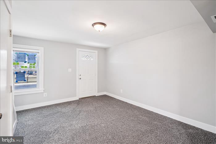 501-503 8th Street Laurel, MD 20707 - Photo 58 of 86 an empty room with windows