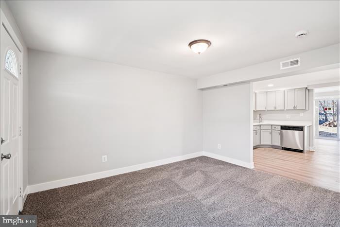 501-503 8th Street Laurel, MD 20707 - Photo 59 of 86 a view of an empty room with a kitchen