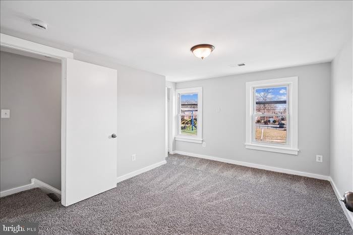 501-503 8th Street Laurel, MD 20707 - Photo 71 of 86 a view of an empty room with a window