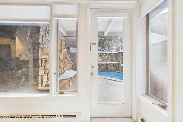 a view of a bathroom with a glass door