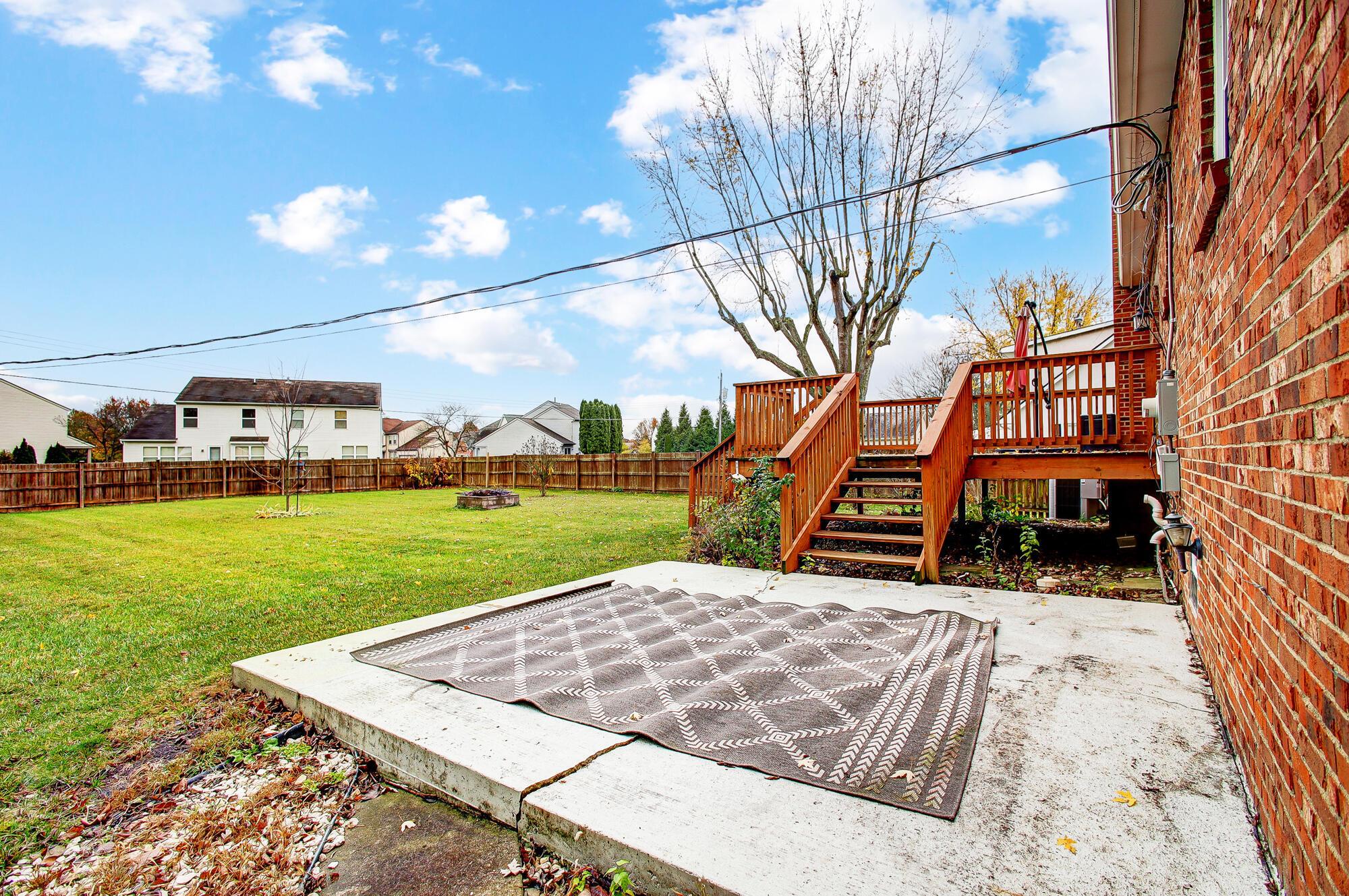 834 Doherty Road Columbus, OH 43228 - Photo 52 of 55 Concrete patio off deck