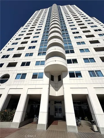 a view of a swimming pool with chairs