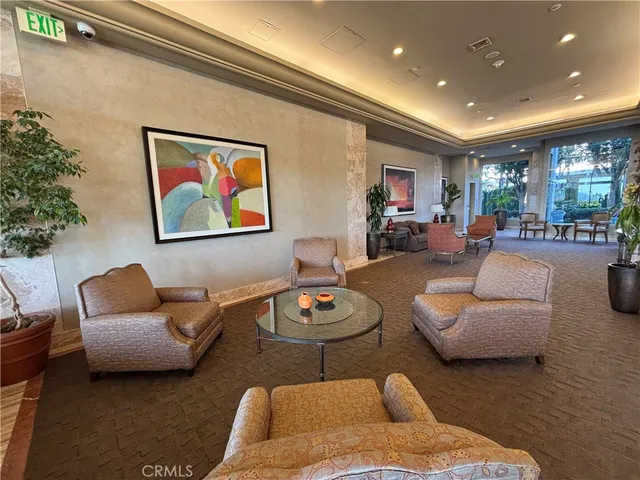 a outdoor space with lots of chairs and mirrors