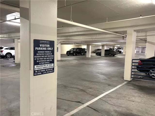 a terrace with a bench and trees