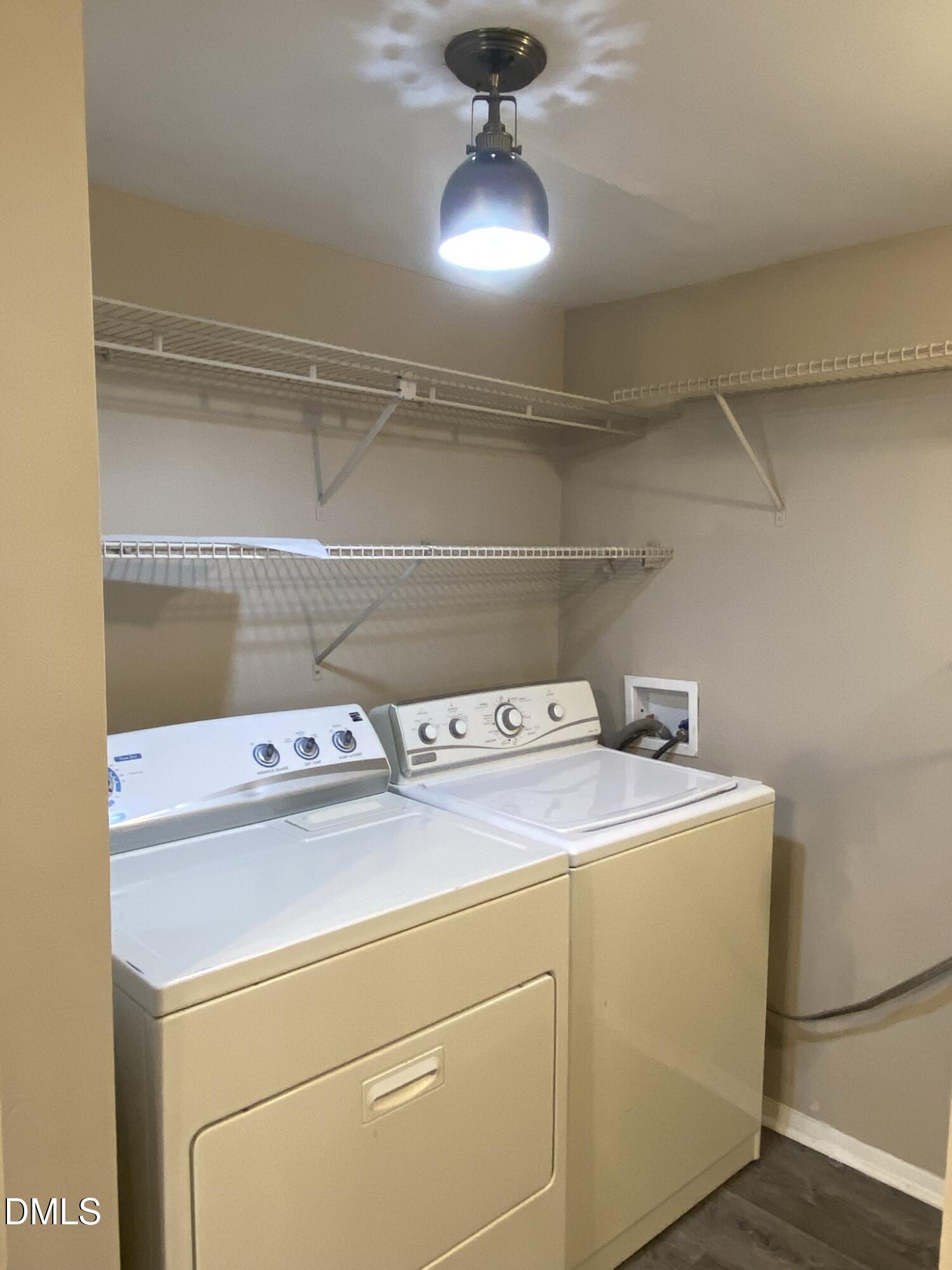 7708 Crown Crest Court Raleigh, NC 27615 - Photo 11 of 27 a utility room with dryer and washer