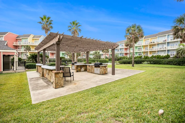 a view of a balcony with wooden floor and outdoor space